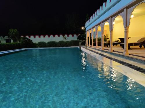 Swimming pool, Satyam Palace Resort in Tilora