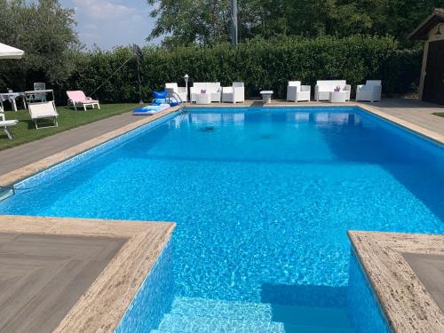 สระว่ายน้ำ, Appartamento in Villa degli Ulivi in อาร์เตนา