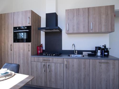 Modern house with dishwasher, on a holiday park in a nature reserve