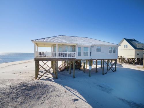 Simple Pleasures - Nothing between you and the water but sugar white sand! home