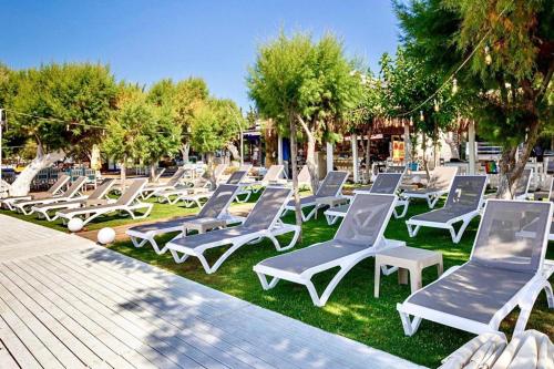 Ali's Hotel Beach - Tap to explore photos