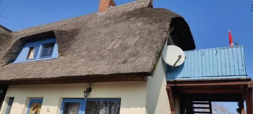 Ferienwohnung im Rohrdachhaus in Wustrow, Deutschland