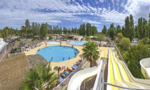 Frejus tout confort, maxi 420 m des piscines, climatisation,plus ventilation toutes les chambres, li near Le Poivrier Nomade