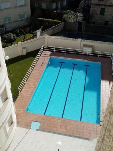  Apartamento en edificio nuevo, con piscina, vistas a la ría y al puerto, ESTANCIA MÍNIMA 14 noches, perfil familiar, no se admiten grupos de jovenes in Sanxenxo