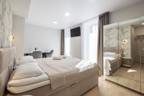 DHARMA Stay APARTAMENTAI su terasa ir vaizdu į miestą Self check-in (DHARMA Stay APARTAMENTAI su terasa ir vaizdu i miesta Self check-in) in Bubiai
