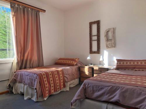 Twin Room with Lake View room in La Miralejos