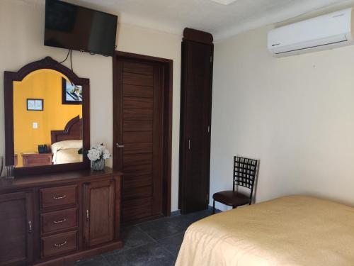 Hotel Delicias Tequila - Tap to explore photos
