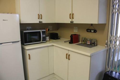 Casa en Gregg -Exquisite 2-bedroom self catering unit - 1 car parking space in Stirling