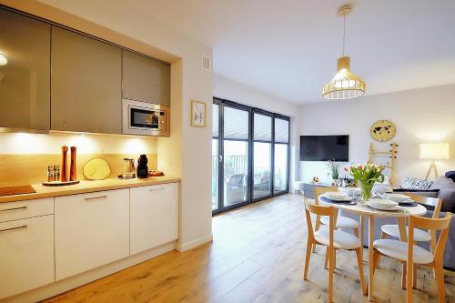 ห้องครัว, OnHoliday Apartamenty ze strefą Relax & Fun, ul Lwowska 12 (OnHoliday Apartamenty ze strefa Relax & Fun, ul Lwowska 12) in ปอดตเชเลอ