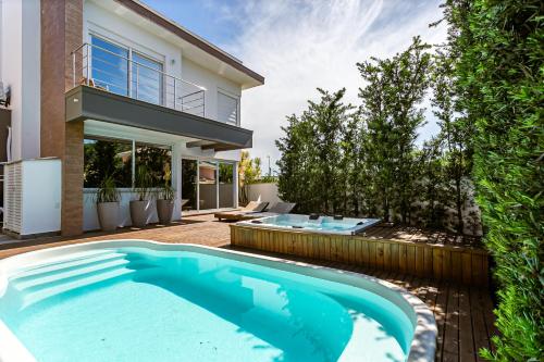 CONFORTO E LUXO CASA A 4 min do MAR do NOVO CAMPECHE em Florianópolis SC Casa em COND FECHADO
