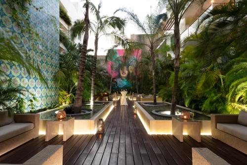 tuin, Hotel The Palm in Playa Del Carmen