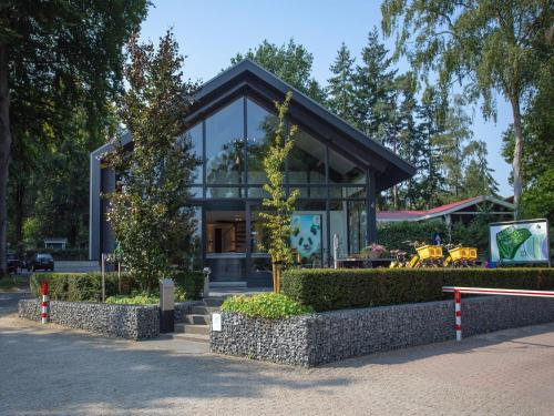 Modern house with roof, located in a holiday park in Rhenen