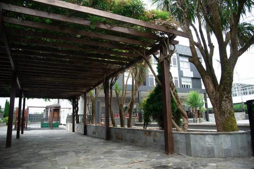 Hotel Los Olmos - Tap to explore photos