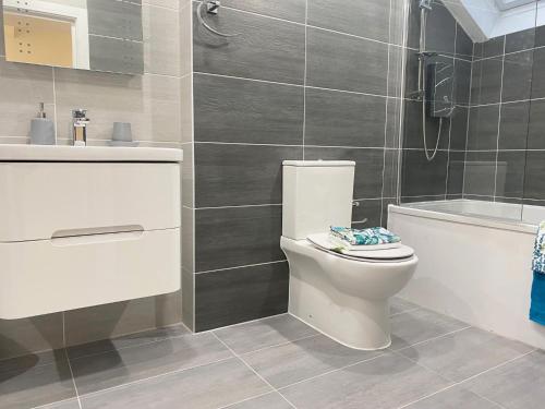 Bathroom, 4 Buttermere House, Cumbria with parking in Great Asby