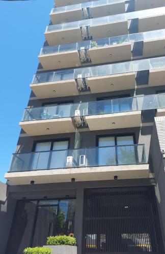 Exterior view, Visita zona surCalido estudio piscina, parking ,laundry Cercano a Ezeiza in Banfield