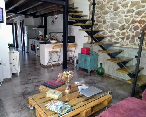 Koplietošanas atpūtas telpa ar TV, La Plazuela del Tiétar, diseño y descanso en Gredos sur (La Plazuela del Tietar, diseno y descanso en Gredos sur) in Casavieja