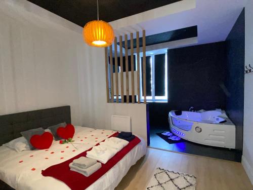 Loft romantique avec jacuzzi comprenant pack romantique et champagne OFFERTS