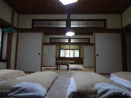 Japanese-Style Large Family Room with Shared Bathroom