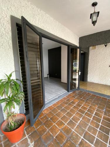 Entrance, Bed & Tennis - Vista Hermosa in Cuernavaca