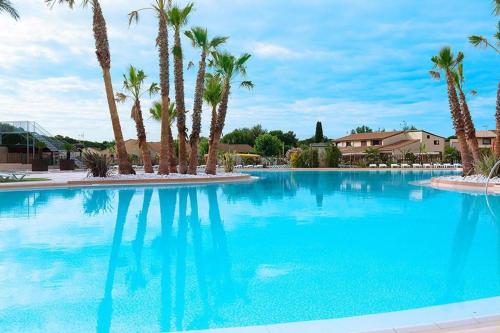 Maison avec piscine chauffée de Pâques à la toussaint accès animation & parc aquatique en supplément de juin à fin septembre - Location saisonnière - Portiragnes