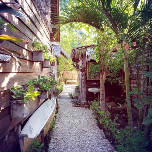 Sunset Moyo Bungalows Room Type -  Bungalow with Shared Bathroom