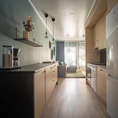 кухня, Hilmantori Apartments by Hiekka Booking in Калайокі