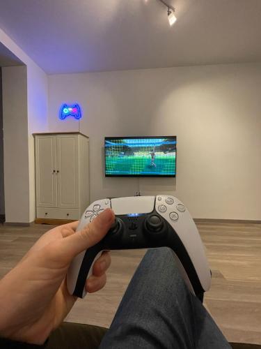 PS5+55 Zoll 4K Fernseher - Gaming Apartment