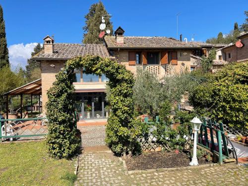 A szálláshely kívülről, Appartamento con Piscina e Giardino a Siena in Costalpino