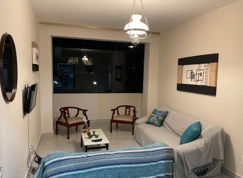 Apartamento confortável na praça central