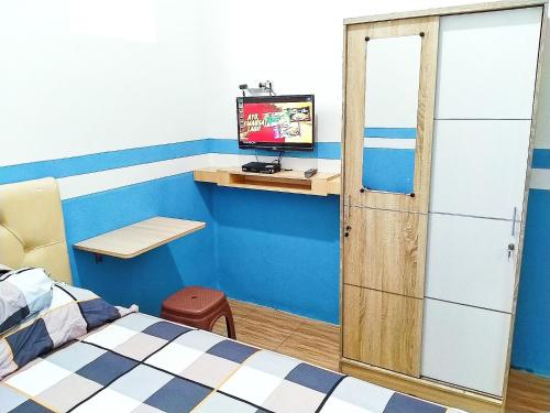 langit biru Room Type - Deluxe Room (2 Adults + 1 Child)
