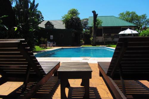 Peldbaseins, Hosteria Helvecia in Montecarlo