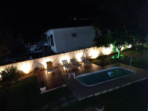 Skats, Casa com piscina, espaço gourmet e salão de jogos. (Casa com piscina, espaco gourmet e salao de jogos.) in Guapimirim
