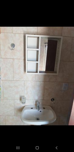 Bathroom, La Peninsula in Plottier
