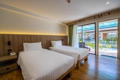 Baan Samui Resort Room Type - Deluxe Double or Twin Room