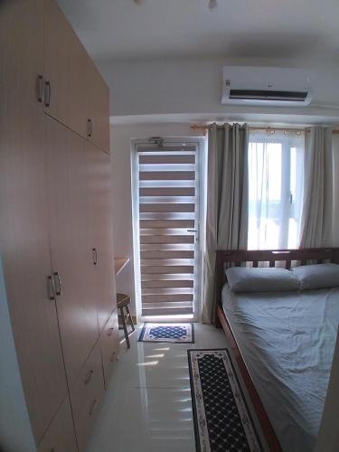 SM South Residences, 1 bedroom with balcony., Manila (fotografie 2)
