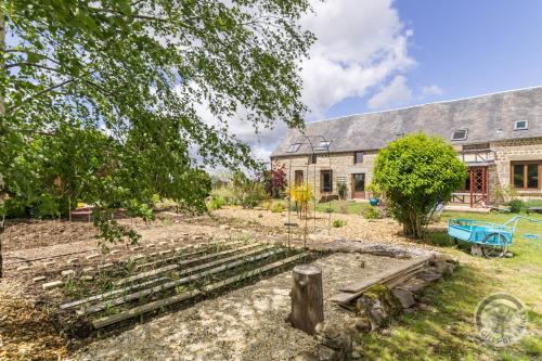 Le jardin des fées - Chambre d'hôtes - Savigny-le-Vieux