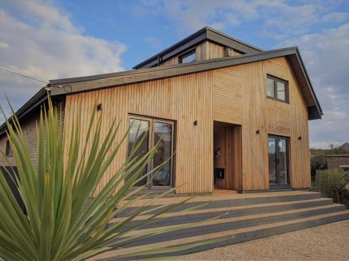 Cranmer - New Eco Beach House 4 Bed HOT TUB & Bikes gîte à louer Iden