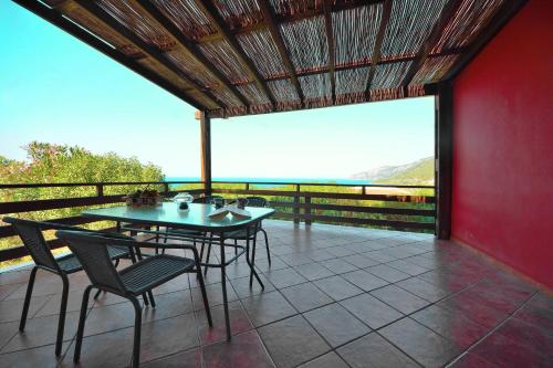 شرفة/ تراس, Mouzakis Villas in Agios Paraskevi