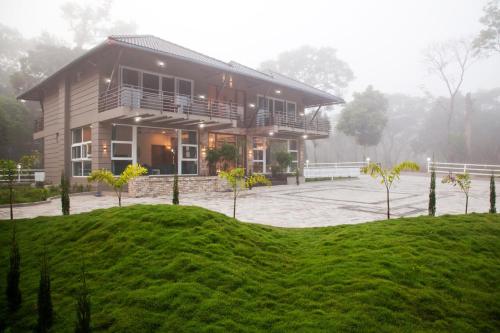 Coffee & Mist Luxury Villa- Comp Breakfast, Pool, Lounge, and Coffee Estate by StayVista