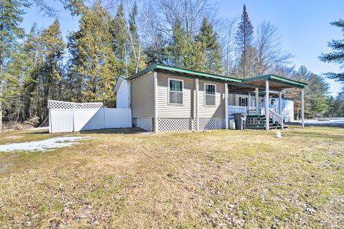 Houghton Lake Area Home with Fire Pit and Yard!