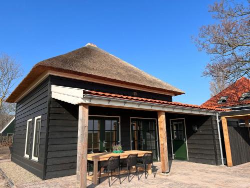  Villa with enclosed garden near the Wadden Sea in 1777 NG Hippolytushoef