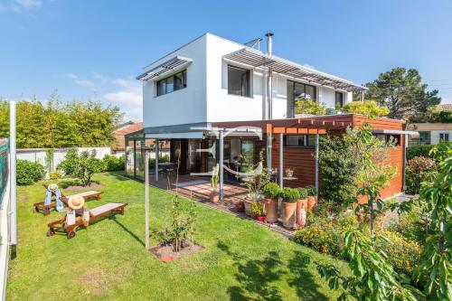 PROMO JULYTeilatua - Superb architect-house a stone's throw from the ocean gîte à louer Chambre-d'Amour