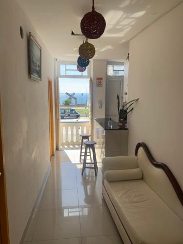 Basic Triple Room with Shared Bathroom image 1