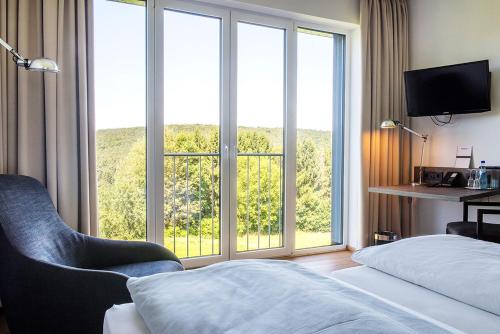 BURGHOF - DAS HOTEL 3.9km von Bad König entfernt