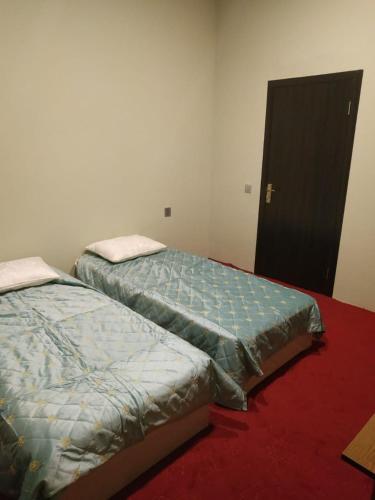 Camera Doppia con Letti Singoli con Bagno