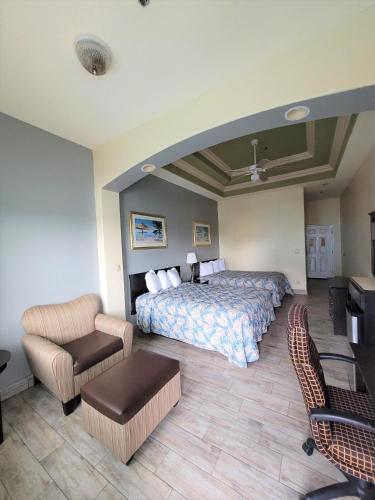 Standard Queen Room with Two Queen Beds room in Casa Bella Hotel and Suites
