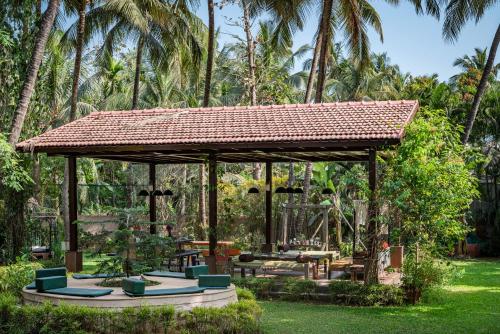 Saffronstays Casa Del Palms, Alibaug - luxury pool villa with chic interiors, alfresco dining and island bar