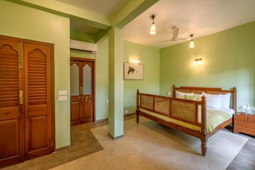 Saffronstays Casa Del Palms, Alibaug - luxury pool villa with chic interiors, alfresco dining and island bar