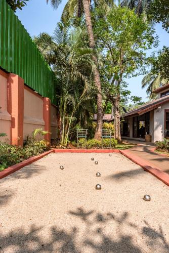 Saffronstays Casa Del Palms, Alibaug - luxury pool villa with chic interiors, alfresco dining and island bar