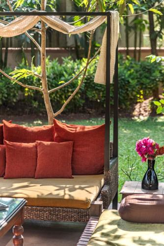 Saffronstays Casa Del Palms, Alibaug - luxury pool villa with chic interiors, alfresco dining and island bar